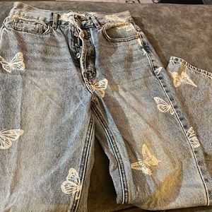 Pacsun butterfly jeans.